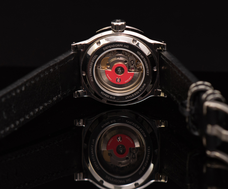 A raised Diefendorff logo appears on the Swiss red oscillating weight
